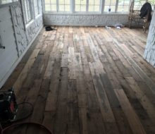 Varied length and width reclaimed heart pine flooring installed