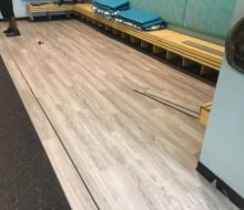 Installing vinyl plank flooring in Manatee Cafe