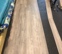 Installing vinyl plank flooring in Manatee Cafe