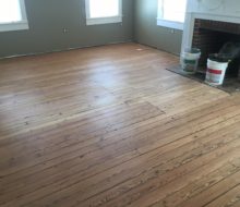 Sanded water damaged old heart pine plank flooring