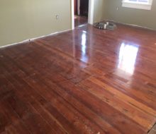 Water damaged old heart pine plank flooring