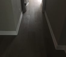 Installed wire brushed oak hardwood flooring