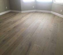 Installed wire brushed oak hardwood flooring