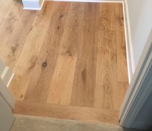 Wire brushed white oak flooring installed