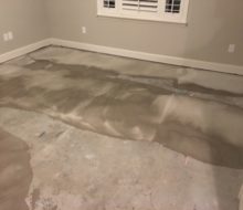 Leveling concrete slab for wood flooring