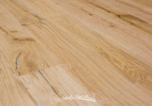 Snow Cap wire brushed White Oak flooring by Naturally Aged Flooring.