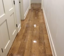 Stained and finished character grade White Oak flooring