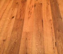 Wire brushed white oak character grade wood flooring installed