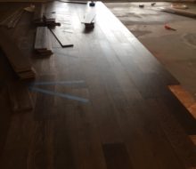 Installing white oak flooring over leveled subfloor