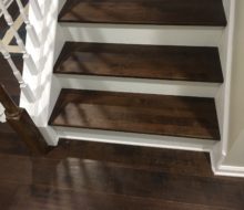 Installed hardwood Maple flooring and matching solid Maple stair treads