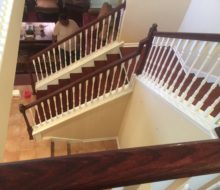 New Brazilian Cherry stair treads - custom stained and installed with new wood flooring on landing