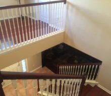 New Brazilian Cherry stair treads - custom stained and installed with new wood flooring upstairs