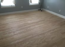 Sanded and hand scraped peeled Red Oak floor