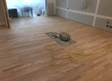 Sanded peeled Red Oak floor with weave-in repair