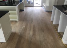 Sanded and scraped red oak flooring