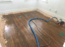 Sanding old wooden floor