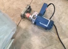 Cutting old tile flooring for removal