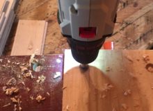 Drilling holes for walnut pegs in red oak flooring