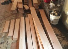 Staging drilled red oak planks