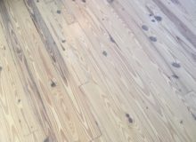 Whitened, knotty heart pine flooring