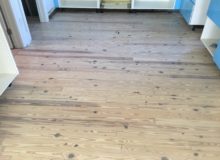 Whitened, knotty heart pine flooring