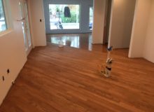 Applying finish to red oak flooring