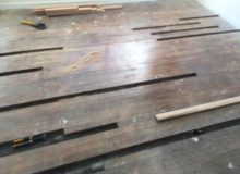 Removing old, water damaged Red Oak wood flooring