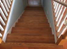 Water damaged staircase, prior to refinishing