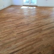 Sanded and finished engineered red oak flooring
