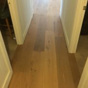 Installed wire brushed white oak wood flooring