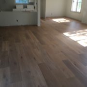 Installed wire brushed white oak wood flooring