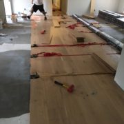 Installing white oak flooring with flooring straps