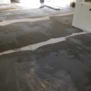 Leveling the concrete slab subfloor