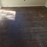 Old heart pine wood flooring, prior to refinishing