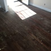 Old heart pine wood flooring, prior to refinishing