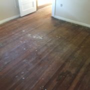 Old heart pine wood flooring, prior to refinishing