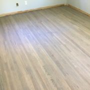 Refinished, grey stained, red oak floors