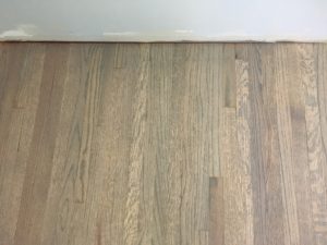 Refinished, grey stained, red oak floors