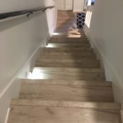 Laminate Oak flooring matches stairway