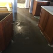 Leveling concrete slab subfloor