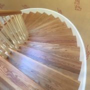 Refinished wooden staircase and rail