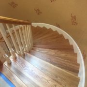 Refinished wooden staircase and rail