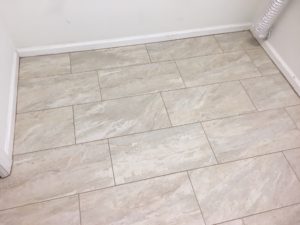 Installed rectangular floor tiles