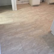 Installed rectangular floor tiles