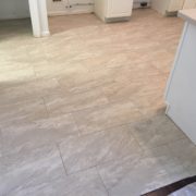 Installed rectangular floor tiles