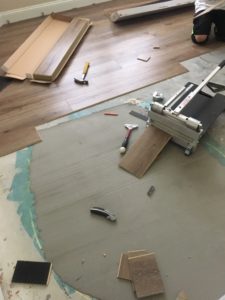 Installing luxury vinyl plank flooring over leveled subfloor