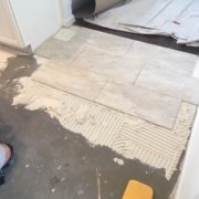 Installing rectangular floor tiles