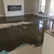 Leveling concrete slab prior to wood flooring installation