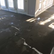 Leveling concrete slab subfloor