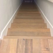 Match stained stair treads installed